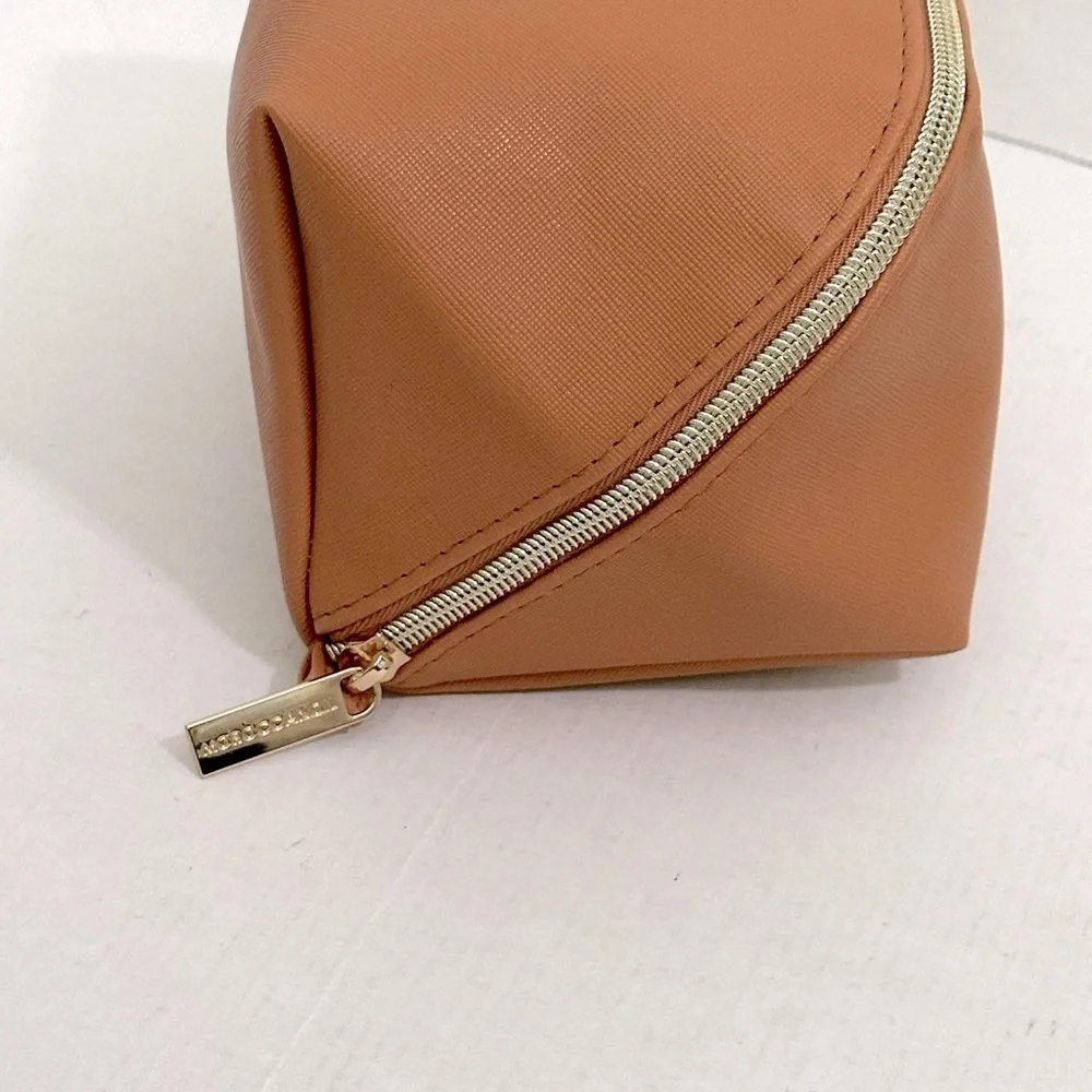 Moroccan oil Tan travel Bag from recycled materials NWOT